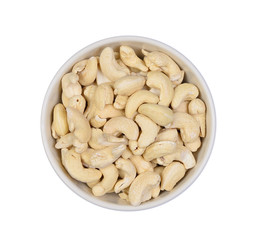 Top view cashew nuts heap in white bowl isolate on white backgro