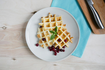 Waffles with berries on a plate
