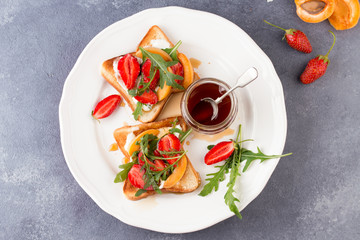 French toast with fresh strawberries and peaches