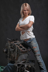 Fototapeta na wymiar girl in engine oil with wrench key