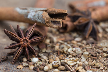 Spices lying on a wooden surface closeup