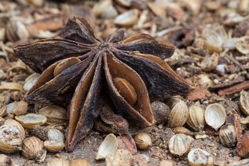 Spices lying on a wooden surface closeup