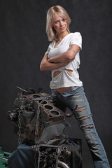 Fototapeta na wymiar girl in engine oil with wrench key