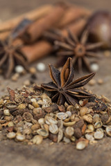 Spices lying on a wooden surface closeup