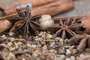 Spices lying on a wooden surface closeup