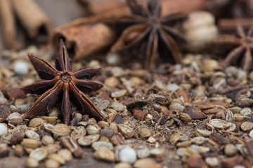 Spices lying on a wooden surface closeup