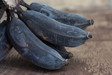 Old banana on a wooden table