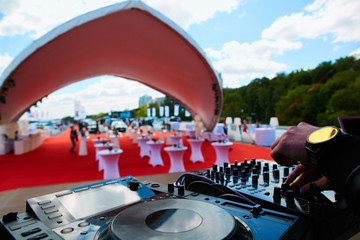 Dj hands on equipment