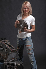 girl in engine oil with wrench key