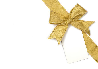 Golden ribbon with bow and card