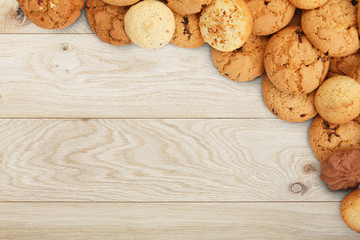 Cookies and biscuits at natural wood with copy space