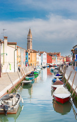 Fototapeta na wymiar view of canal with colorful old houses of Burano island, Venice, Italy