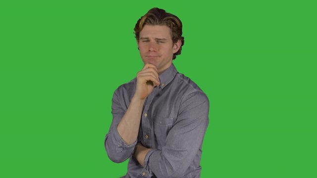 Man looks at camera quizzically (Green Key)