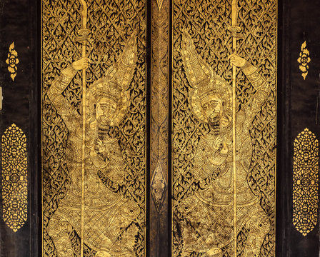 Isolated Thai temple door Thailand ancient art.