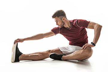 Strong male athlete training his body