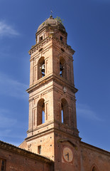 Fototapeta na wymiar belltower on ancient building in Siena, Italy..