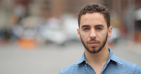 Young man in city face portrait smile