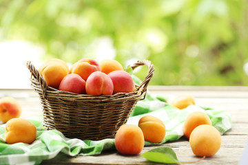 Ripe apricots fruit on grey wooden table