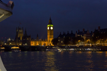Fototapeta premium LONDON, UNITED KINGDOM - SEPTEMBER 11 2015: London By night. View of the Big Ben from the Thames river
