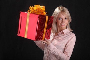 blonde with a gift in the hands