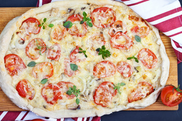 Delicious italian pizza served on wooden table