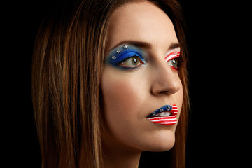 Portrait of beautiful girl with USA makeup