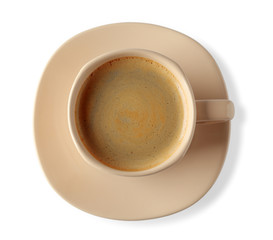 Cup of coffee with foam on light background