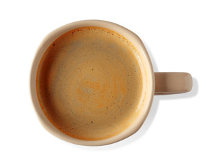 Cup of coffee with foam on light background