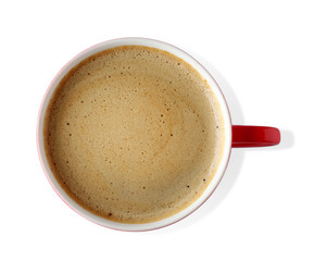 Cup of coffee with foam on light background