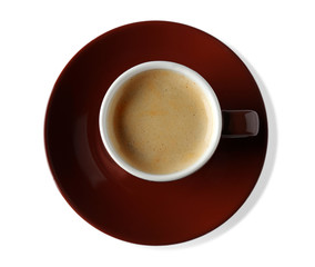 Cup of coffee with foam on light background