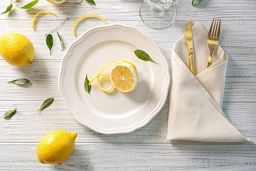 Beautiful table setting on wooden background