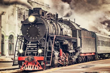 Wanddecoratie Trein Retro steam train departs from the station.  © serjiob74