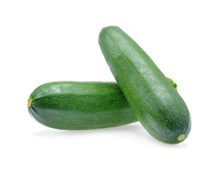 green zucchini vegetables isolated on white