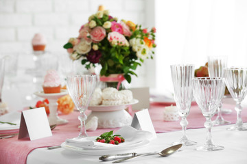 Beautiful served table for wedding or other celebration in restaurant