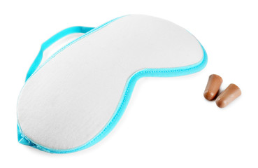Sleeping mask and earplugs, isolated on white