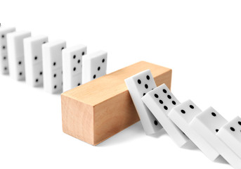 Dominoes with wooden brick, isolated on white