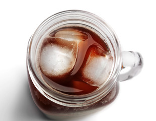 Iced coffee in glass jar on white background