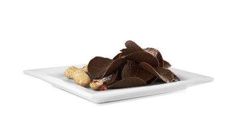 Chocolate chips and peanut on white background
