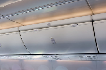 Overhead compartment in commercial aircraft.