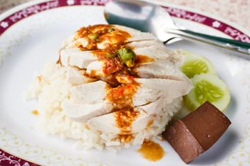 Hainanese chicken rice.
