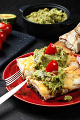 Mexican chimichanga with guacamole dip