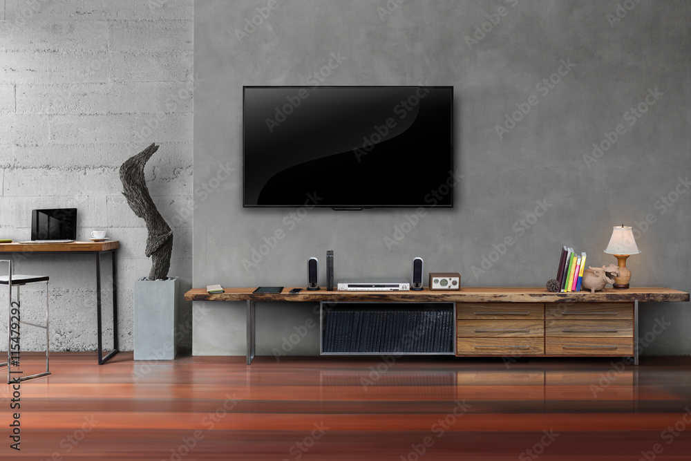 Wall mural Led tv on concrete wall with wooden table in living room