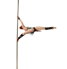 Pretty female gymnast performs trick on pylon