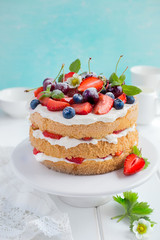 summer sponge cake with cream and fresh berries