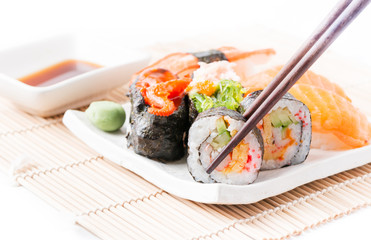 sushi on white dish isolated