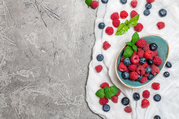 Fresh summer berries in vintage bowl 