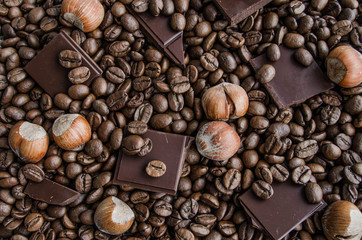 Broken chocolate, nuts and coffee beans
