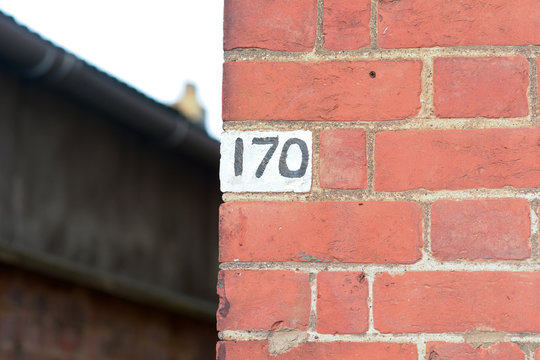 House number 170 painted sign