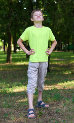 teenage boy portrait like a Superman posing on outdoor, summer season