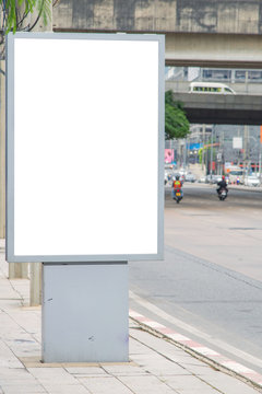 blank billboard on road with city view background